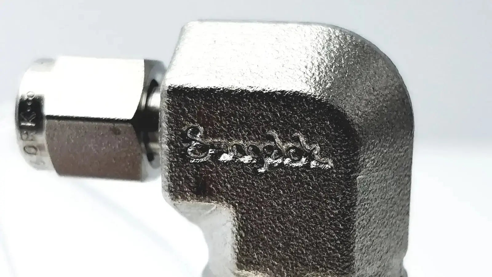 Silver-colored metal micro matic inlet keg coupler with brushed finish and snap-on engraving for beer kegs up to 12 psi