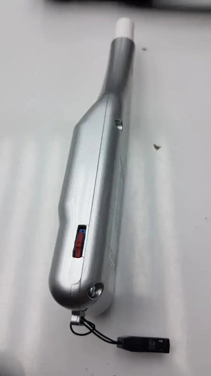 Silver metallic micro medical devices palmscan p2000 fastpach pachymeter with white cap and black lanyard attachment