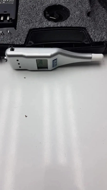 Silver micro medical devices palmscan p2000 fastpach pachymeter with white probe tip black buttons and lcd screen
