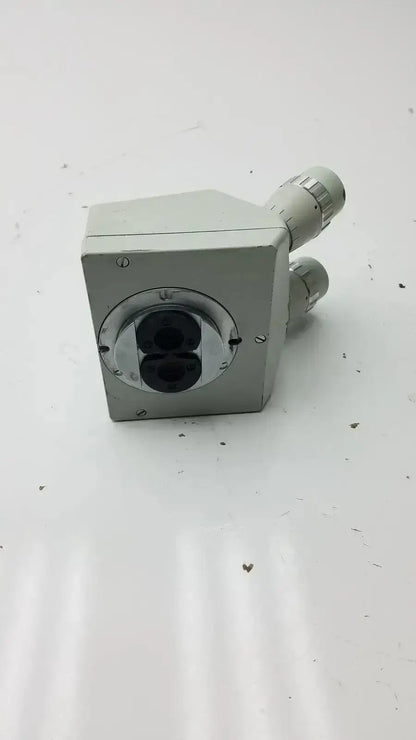 Silver metallic microscope binocular head p16x with dual eyepieces and adjustable focus knobs for precise viewing