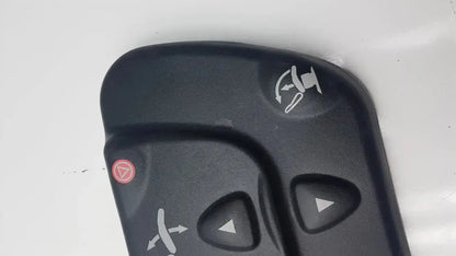Black plastic midmark 647 podiatry chair foot control with white directional and red circular buttons for chair foot control