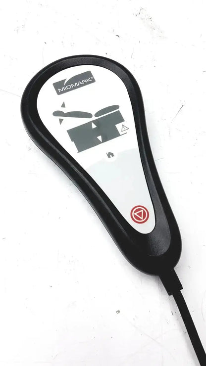 Black and white midmark exam table hand remote with digital display black plastic casing and attached cable
