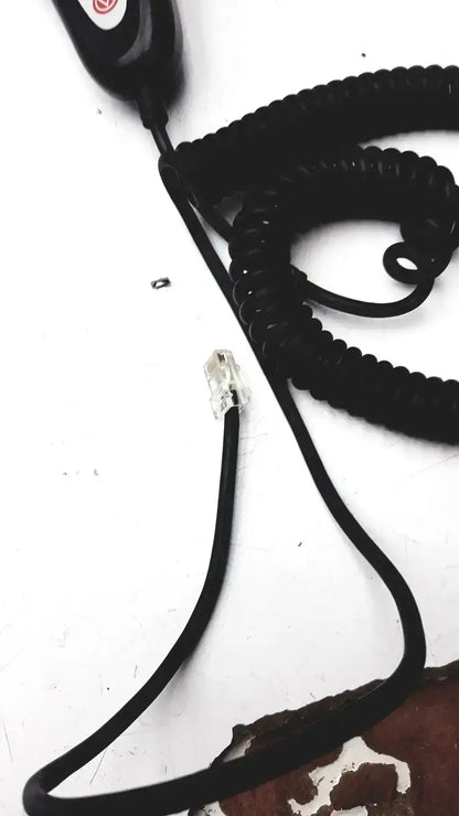 Black coiled telephone handset cord with clear rj-45 connector for midmark exam table hand remote control housing