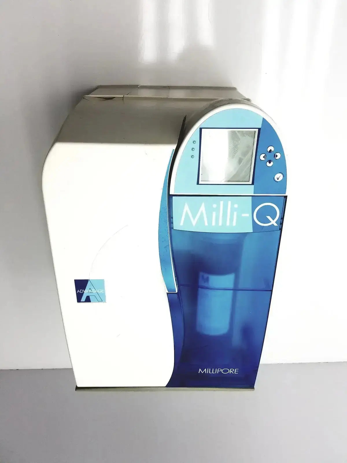Blue and white millipore milli-q advantage a10 toc monitor water purification system with digital display and control buttons