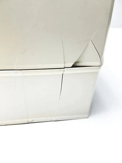Beige cardboard box with creases and a torn corner for millipore milli-q advantage a10 toc monitor packaging