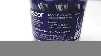 Blue plastic container holding multiple mini pre-surgery skin markers with scurb resistant ink for medical use
