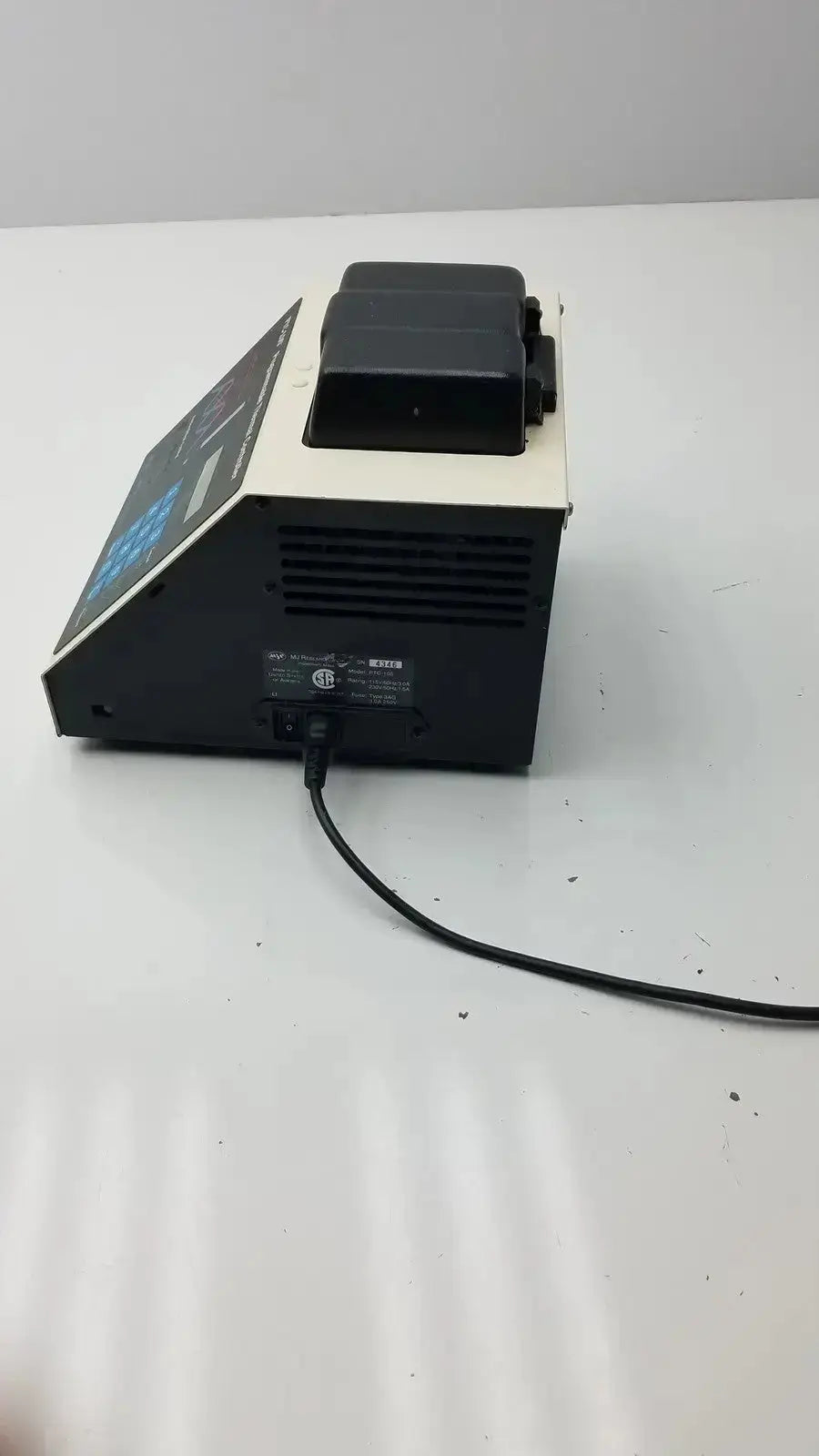 Mj research ptc-100 programmable thermal controller featuring black and beige receipt printer with digital display panel