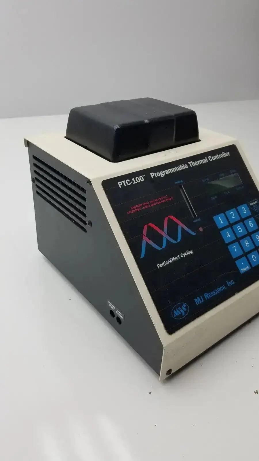 Beige and black mj research ptc-100 programmable thermal controller with digital display blue keypad and front panel logo