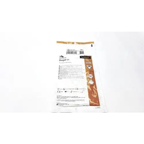 Biogel pi sterile medical gloves in a clear plastic package with brown and white labeling.