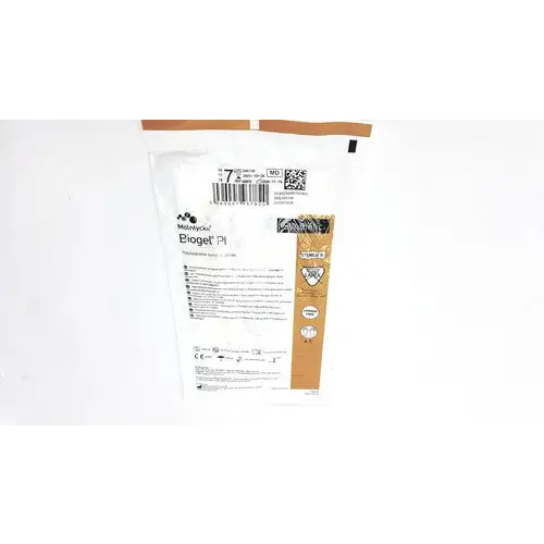A white and brown packaged medical glove labeled ’biogel p1’’ by medline.