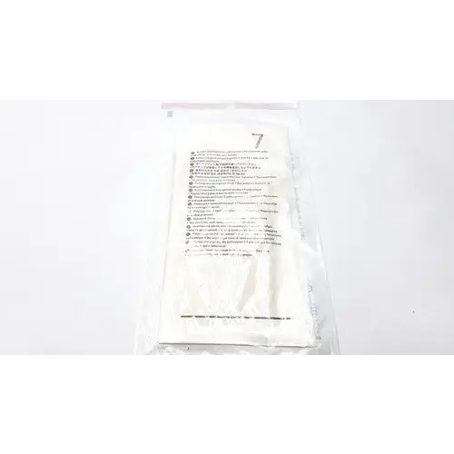 A white, sterile medical gauze pad sealed in a clear plastic package with printed instructions and the number ’7’’ visible.