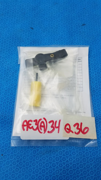 Black plastic toggle with yellow handle inside clear bag for motorola rln6230a reuse medical equipment kit