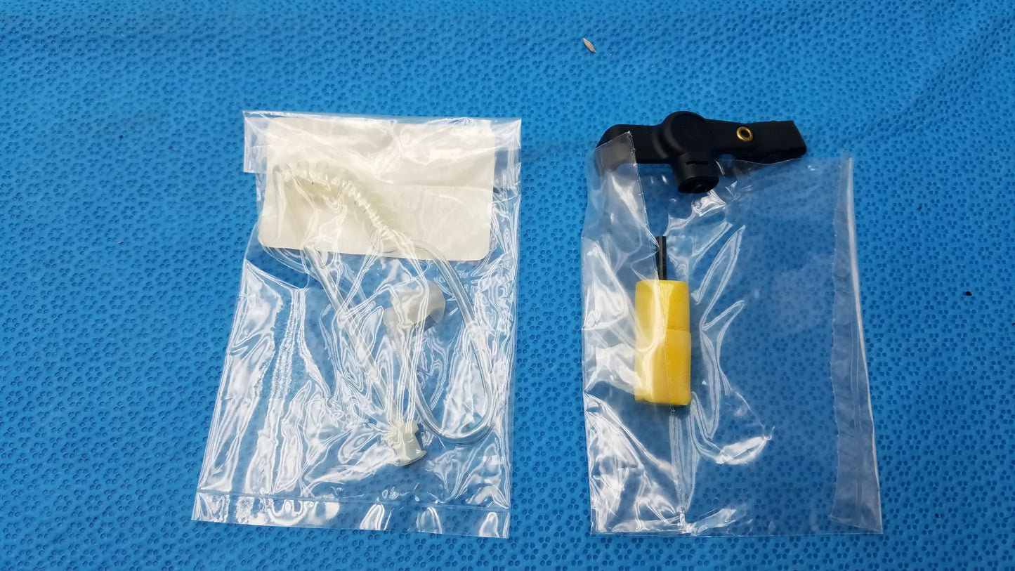 Yellow and black medical equipment components in clear plastic bags for motorola rln6230a reuse medical equipment kit