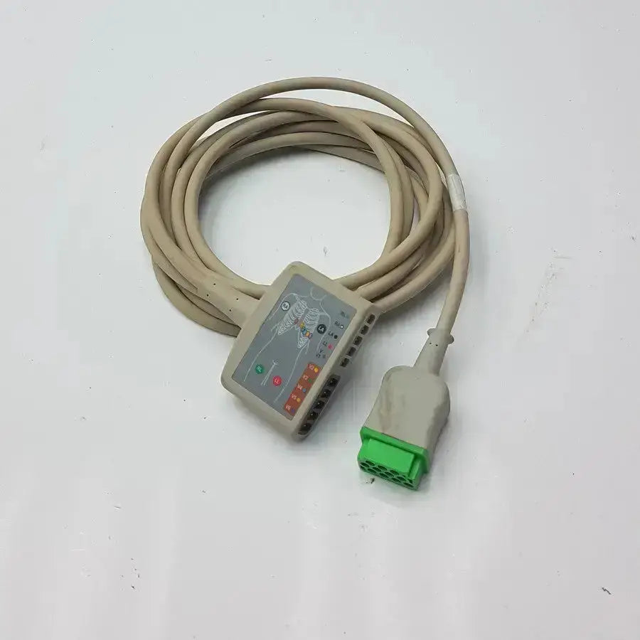 Beige multi-link ecg ttrunk cable with gray control unit and green multi-pin connector by GE showing anatomical diagram