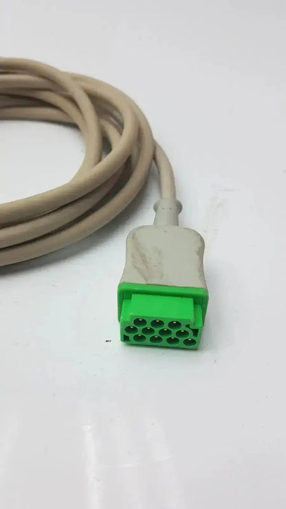 Beige medical-grade multi-link ecg ttrunk cable by ge with a green 12-pin connector for reliable ecg ttrunk connectivity
