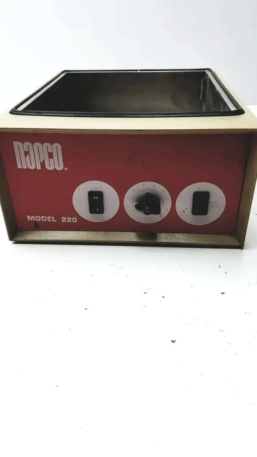 Napco national appliance company model 220 water bath featuring a red and beige heating block with three circular control knobs