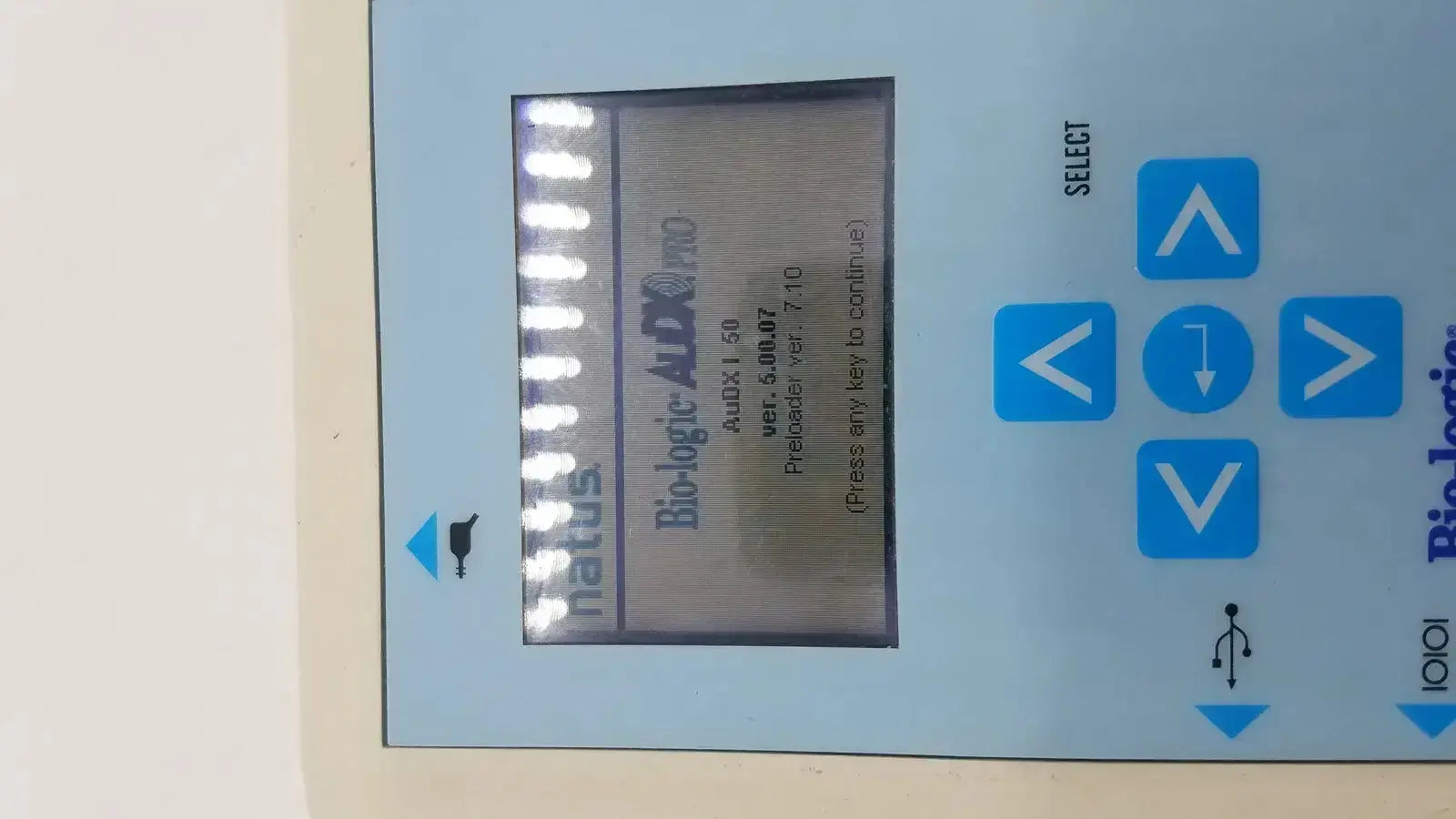 The screen displays a blue button bio-logic audx pro device showing version 5.08 and preloader version 7.10 in natus bio-logic audx