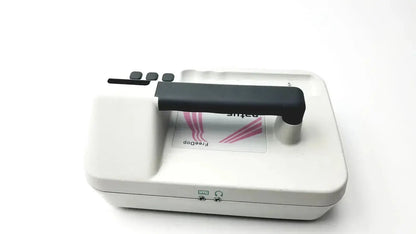 White handheld device with black handle and buttons featuring pink logo from natus neurology freedop dr00128 g-bbac5-1f