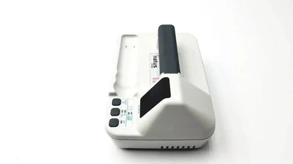 White and black natus neurology freedop dr00128 medical device with handle control buttons and ventilation slots