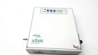 White rectangular brain monitor with teal branding and control buttons from natus neurology xltek for reuse medical equipment