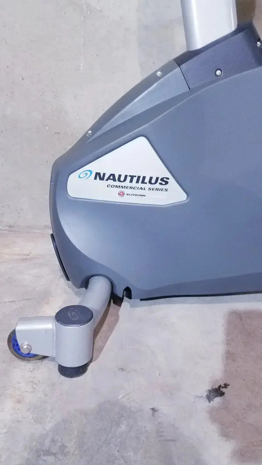 Gray nautilus commercial series schwinn blue indoor cycling bike with sleek metallic frame and modern design