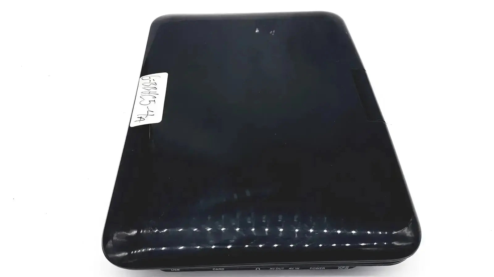 Naxa 10 inch portable dvd player model npd-1003 with black glossy plastic finish and rounded edges portable dvd player