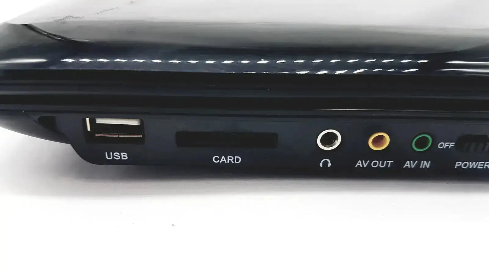 Black plastic glossy portable dvd player by naxa with usb card slots and av in out jacks back view