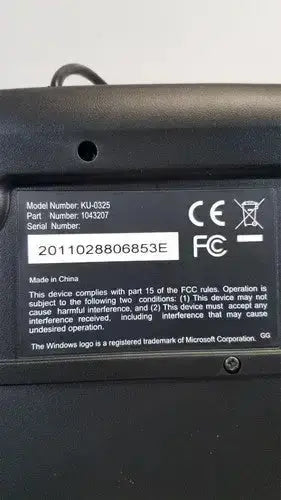 Black ncs usb wired plug keyboard back showing model serial number and regulatory compliance for play pc computer use