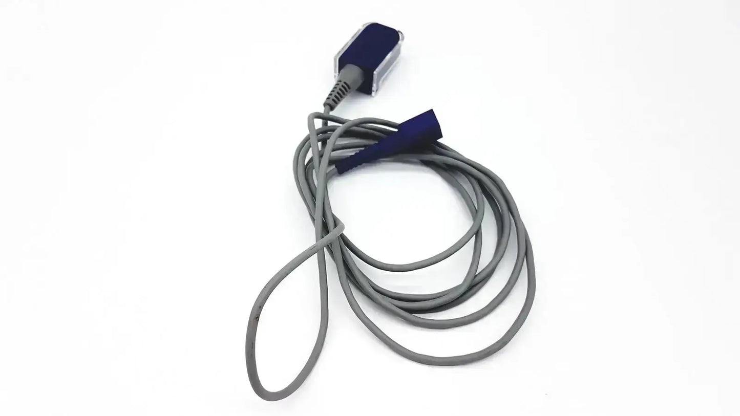 Gray coiled nellcor dec-8 adapter extension spo2 cable with dark blue sensor head and matching cap for medical use