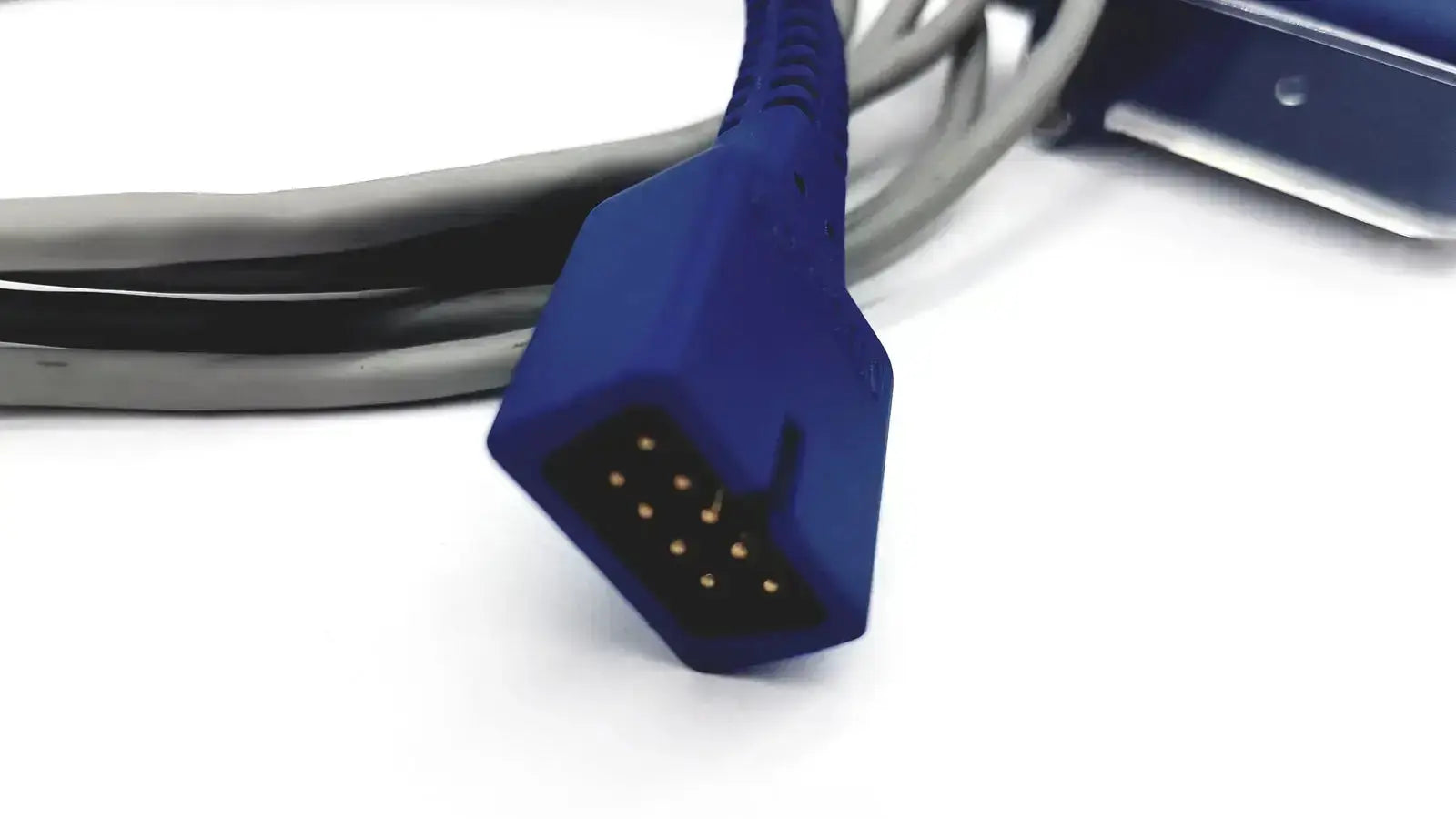 Blue plastic nellcor dec-8 adapter extension connector with nine gold-colored pins for spo2 cable connection