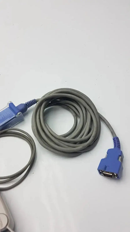 Gray coiled extension cable with blue connectors for nellcor finger clip used medical equipment for sale