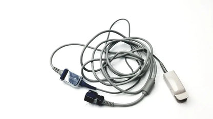 Gray coiled Nellcor original spo2 adapter cable with black connector and white clip attachment for oxygen sensor use