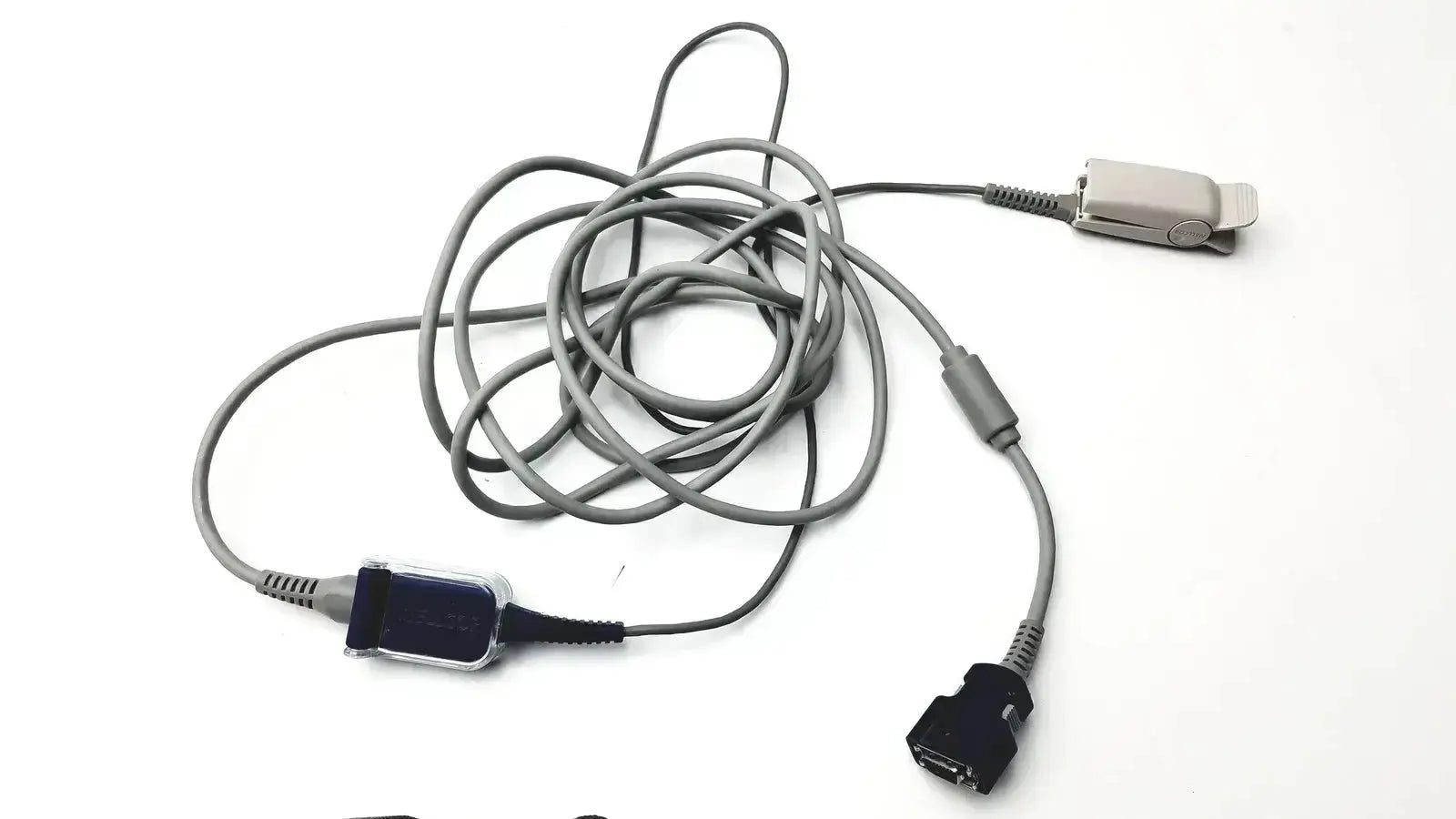 Gray coiled spo2 adapter cable with silver clip and black connectors for nellcor original oxygen sensor use