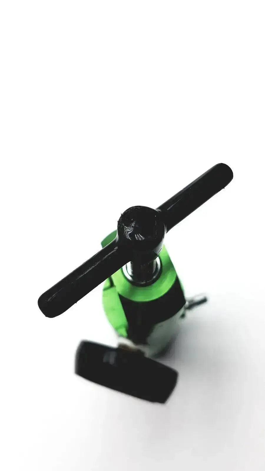 Green and black cross handle bottle opener designed for use with new drive medical mini oxygen tank regulator model 18302GN