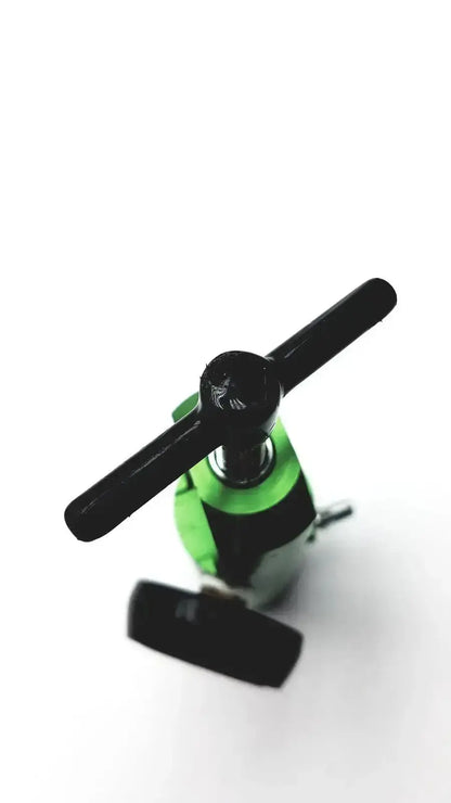 Green and black cross handle bottle opener designed for use with new drive medical mini oxygen tank regulator model 18302GN
