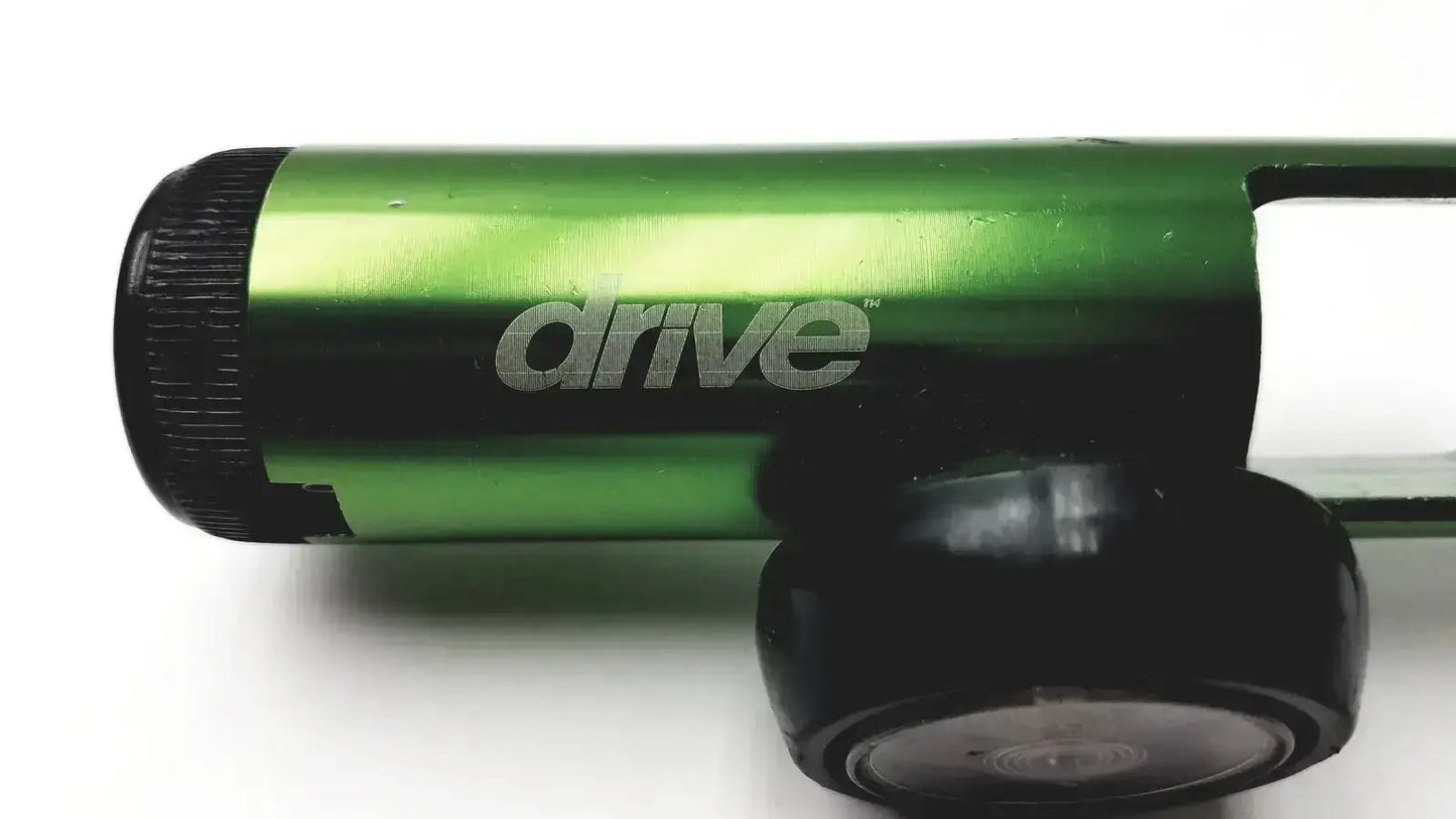 New drive medical mini oxygen tank regulator model 18302gn with green metallic cylindrical body and black textured grip