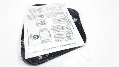 Black silicone heat-resistant moldable lumbar insert with printed instructions in clear plastic packaging do not microwave label