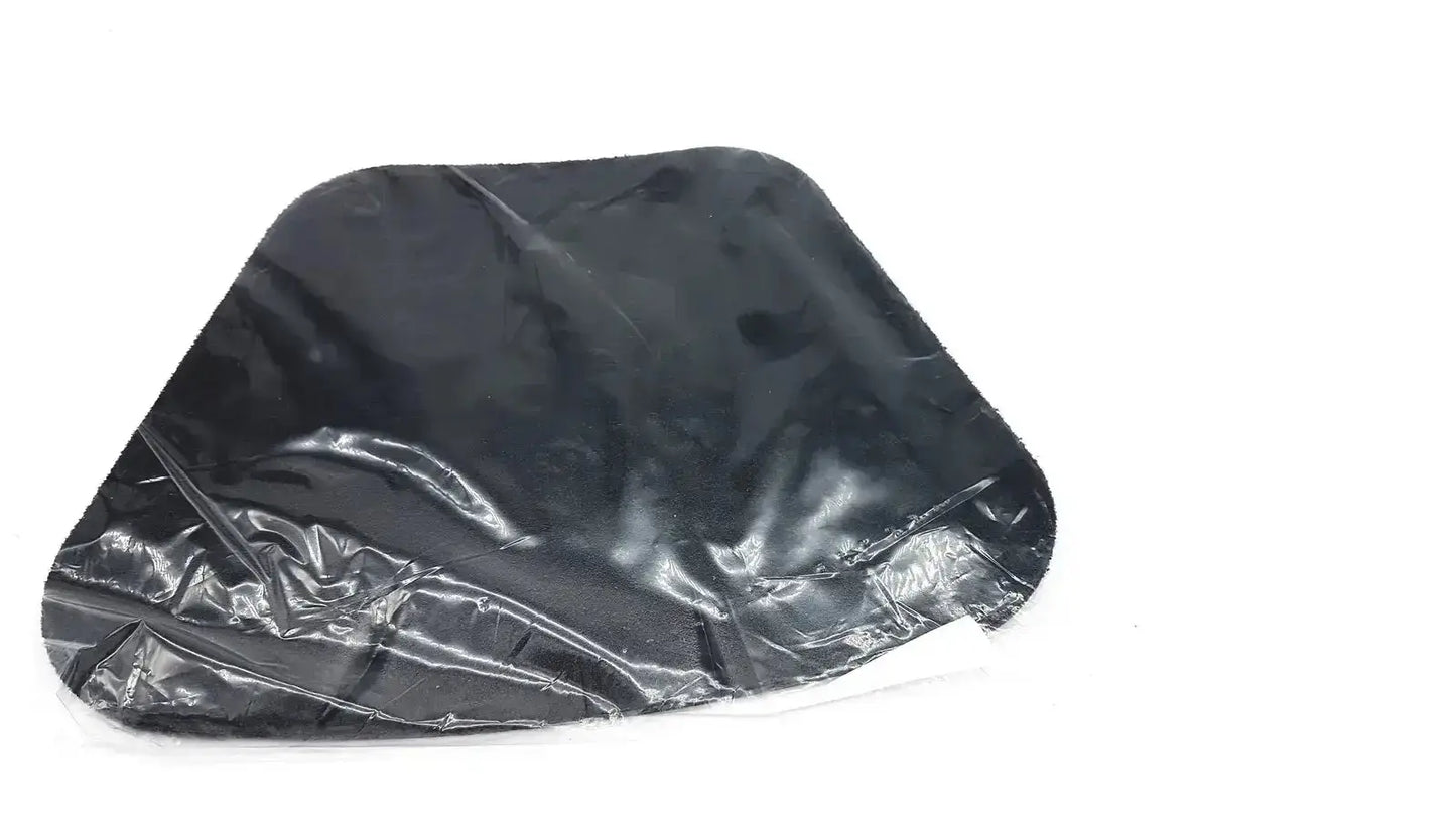 Black glossy plastic bag with crinkled texture and irregular edges containing moldable lumbar insert new option sports