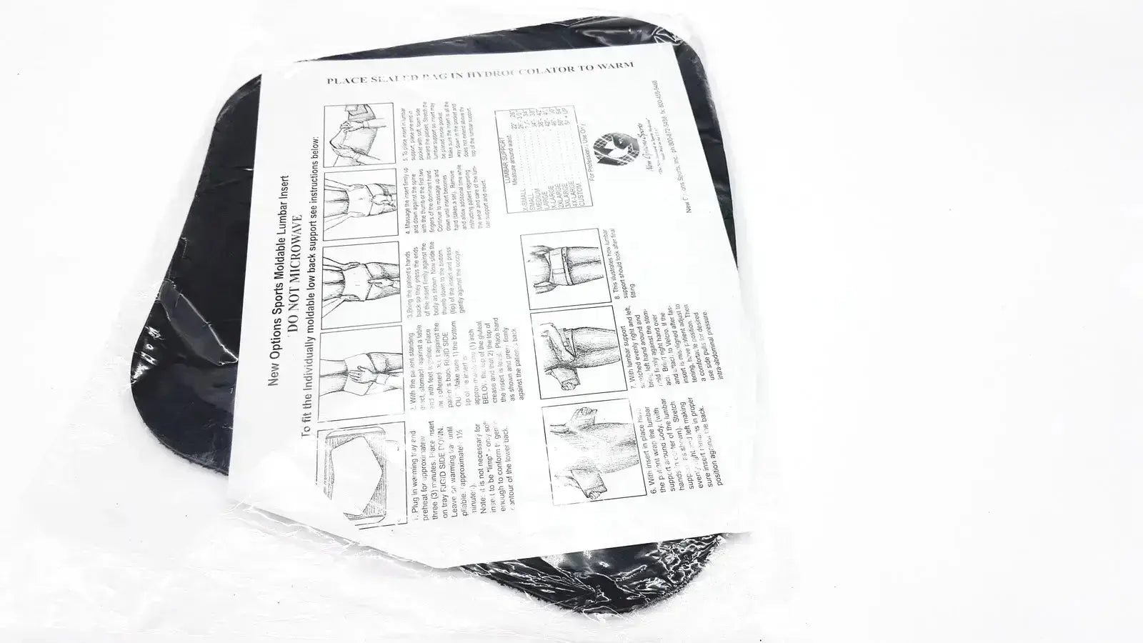 Black plastic moldable lumbar insert for sports in clear packaging with instruction sheet new option do not microwave