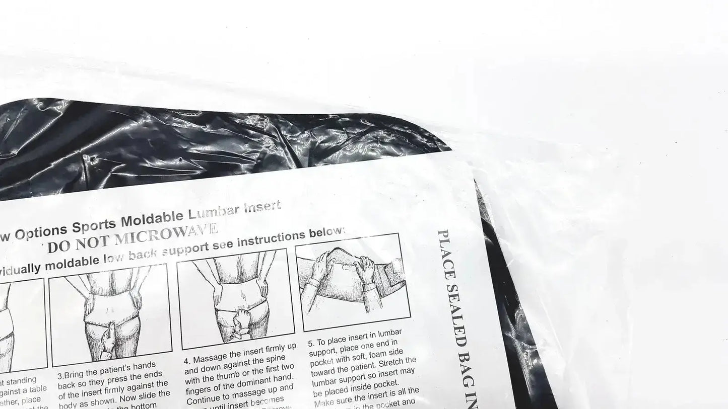 Black plastic bag containing a white instruction sheet for a moldable lumbar insert with microwave warning label