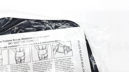 Black plastic bag containing a white instruction sheet for a moldable lumbar insert with microwave warning label