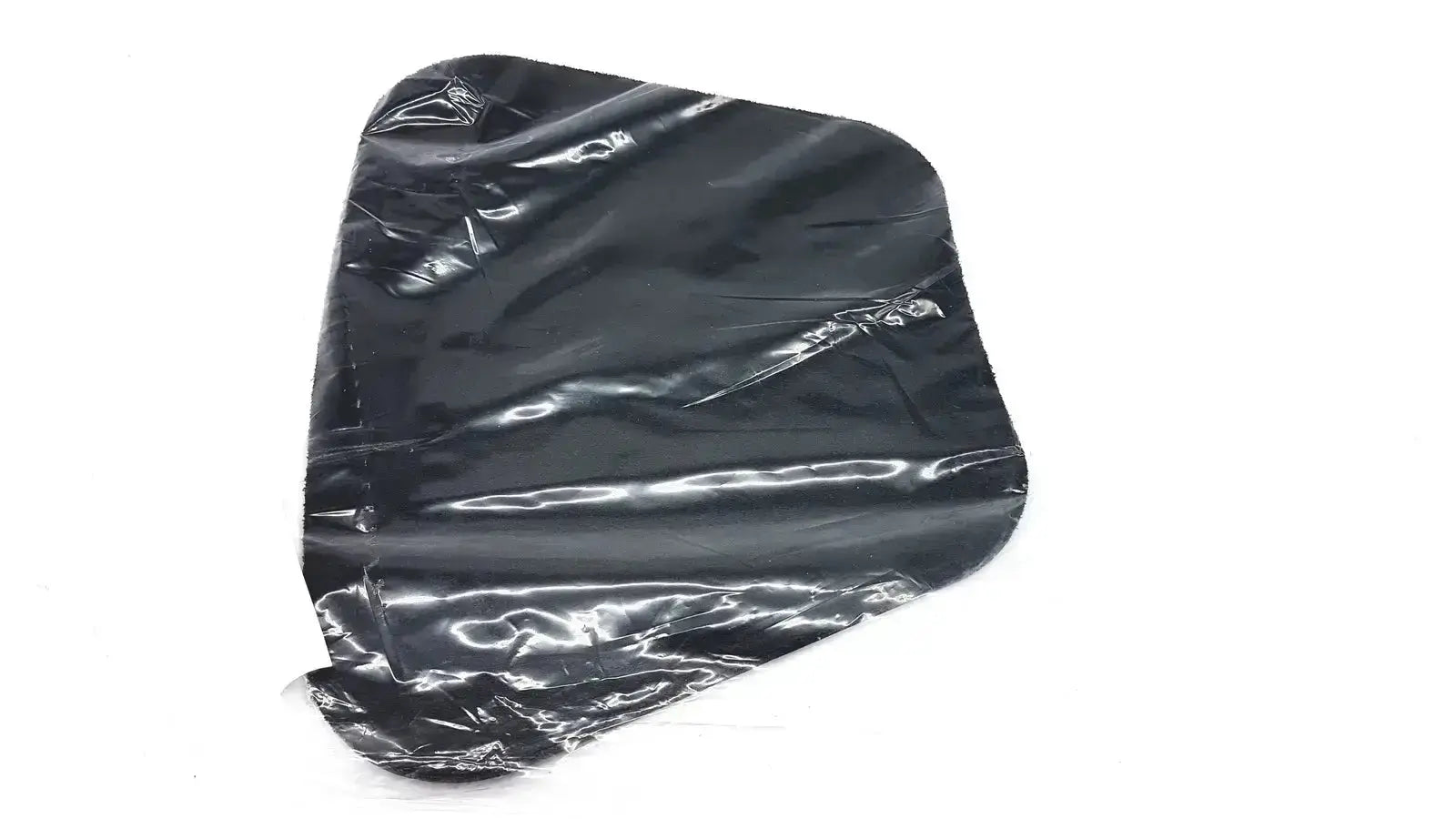 Black plastic bag with a crinkled glossy surface containing a new option sports moldable lumbar insert do not microwave