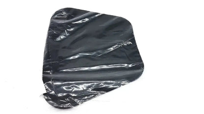 Black plastic bag with a crinkled glossy surface containing a new option sports moldable lumbar insert do not microwave