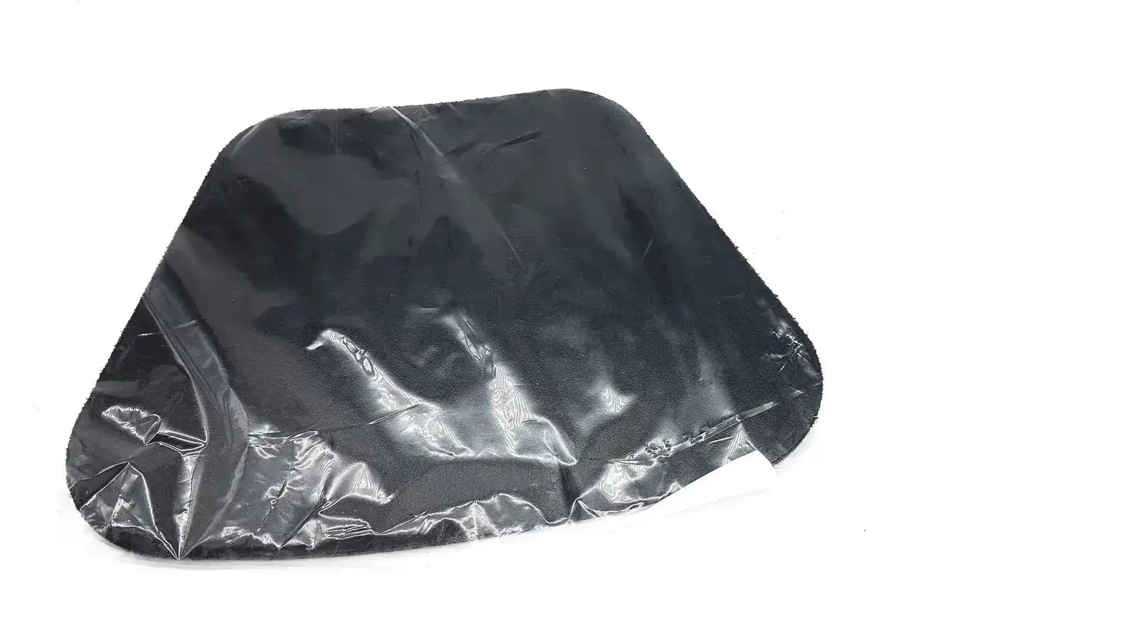 Black glossy plastic bag with crinkled texture containing new option sports moldable lumbar insert do not microwave
