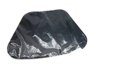 Black glossy plastic bag with crinkled texture containing new option sports moldable lumbar insert do not microwave