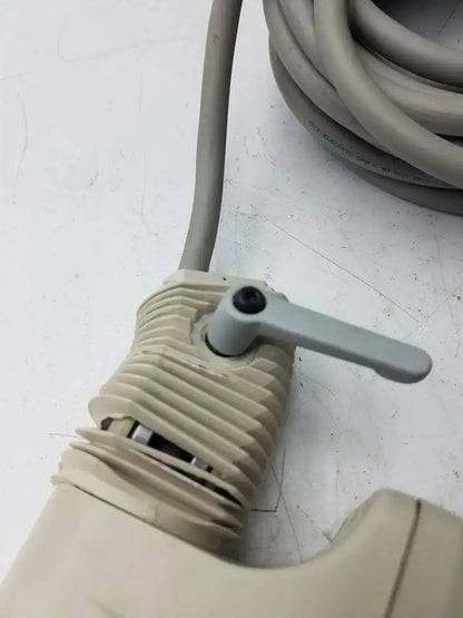 Beige plastic valve with ribbed body and gray handle on nihon kohden ls-703a photic stimulator device