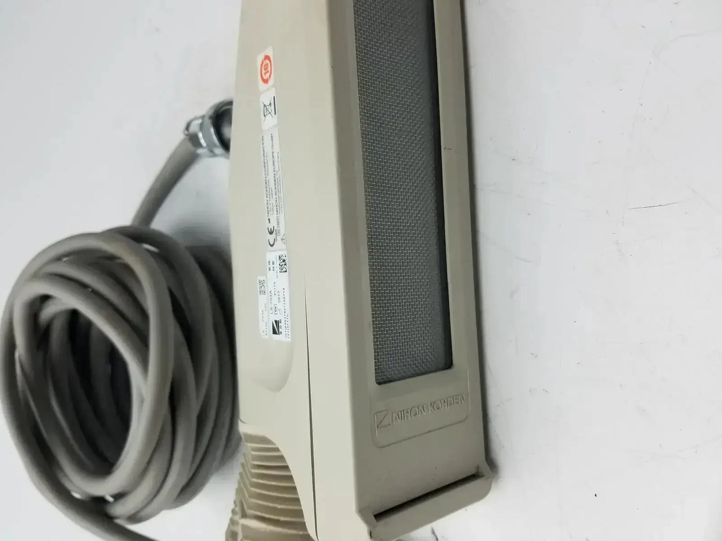 Beige nihon kohden ls-703a photic stimulator sensor with gray mesh panel and coiled cable for precise monitoring