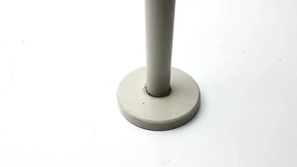 Gray cylindrical stand with flat circular base for Nikon 030039 binocular microscope, ideal to buy used medical equipment