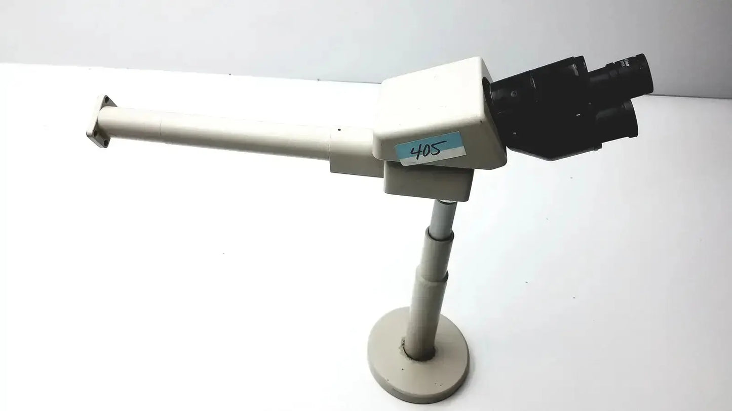 Beige and black nikon 030039 binocular microscope with adjustable arm on circular base ideal for buy used medical equipment