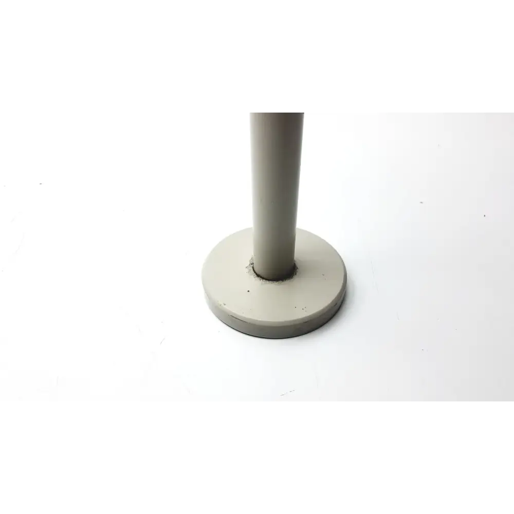 Gray cylindrical stand with a circular base